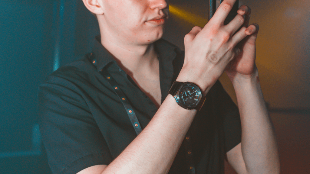 holding my phone taking photos at the Sesh Sundays event 2023